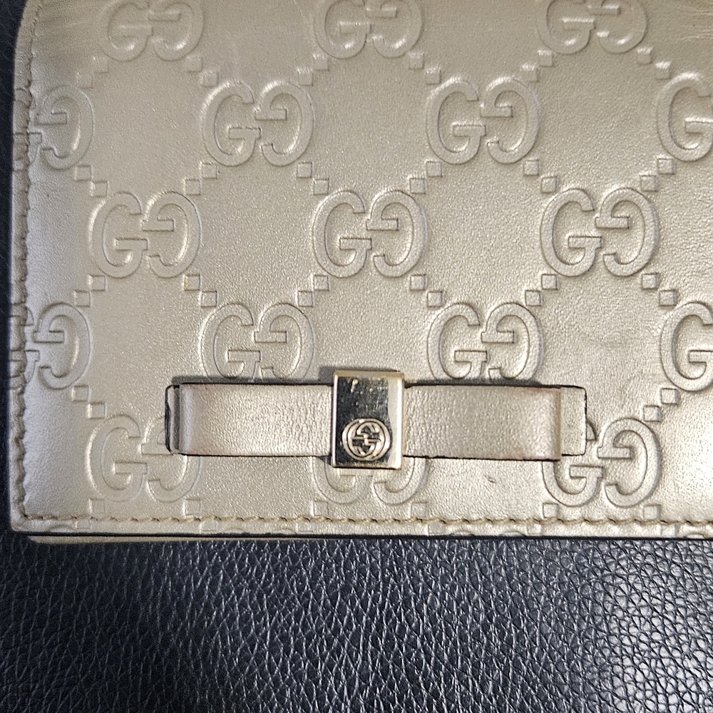 Gucci Gold Embossed Leather Wallet